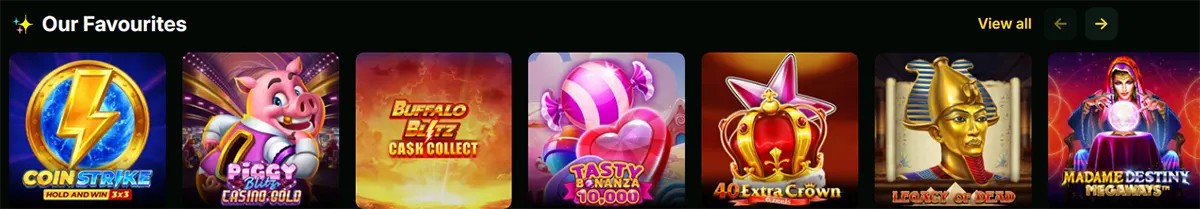 “Our Favourites” slot carousel showing game tiles such as Coin Strike, Piggy Blitz, Buffalo Blitz Cash Collect, Tasty Bonanza 1000, 40 Extra Crown, Legacy of Dead, and Madame Destiny Megaways, with a “View all” link and arrow controls.